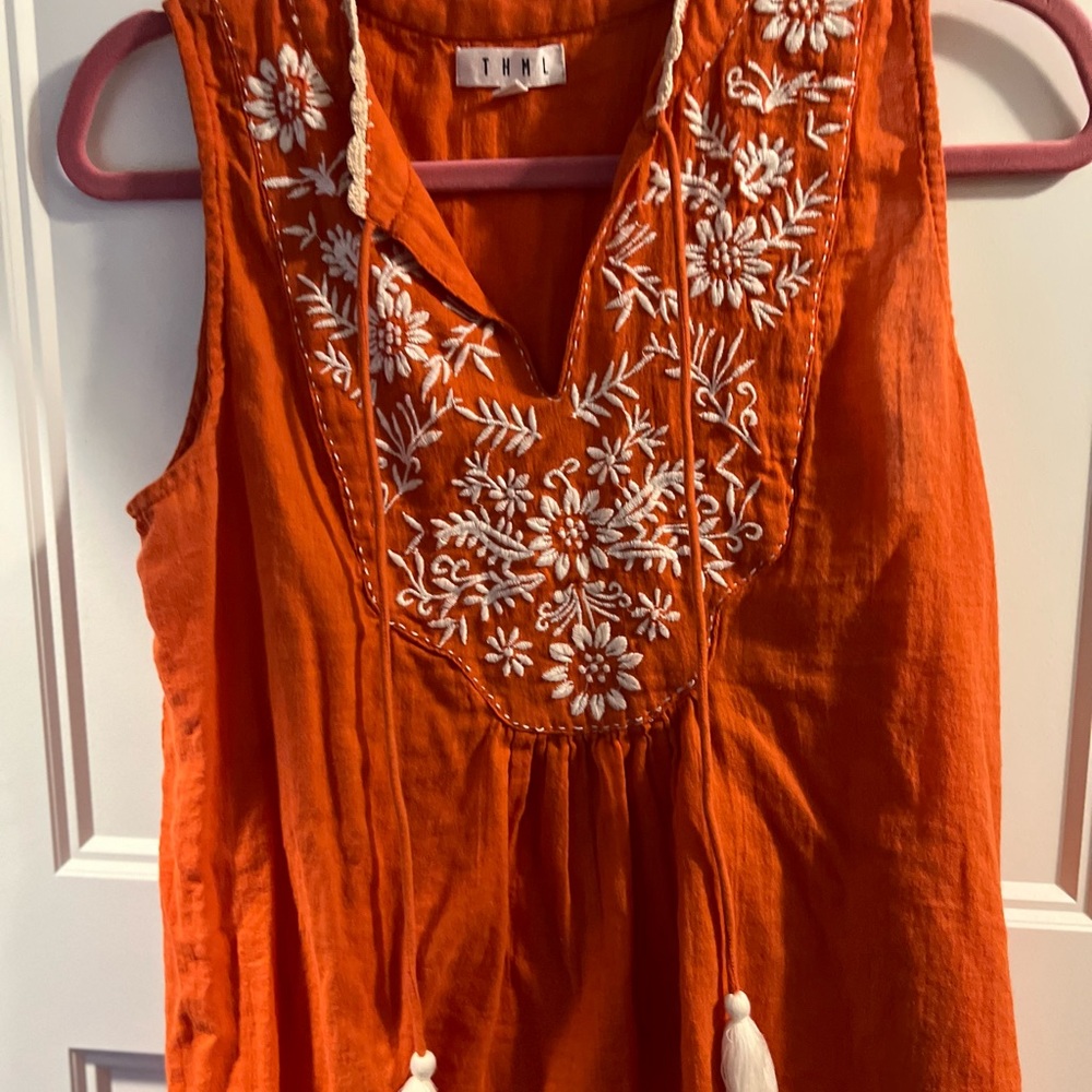 THML orange and cream top